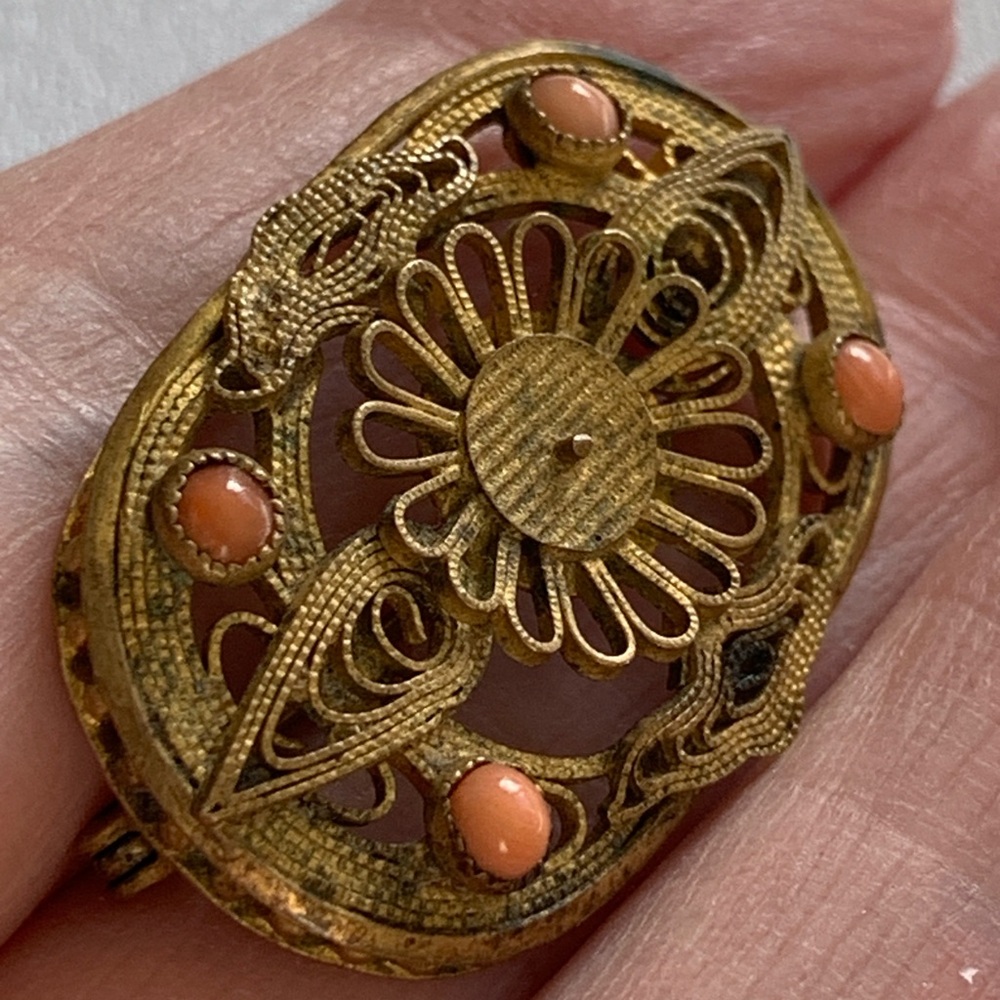 Victorian turn of the century angel skin coral throat brooch.